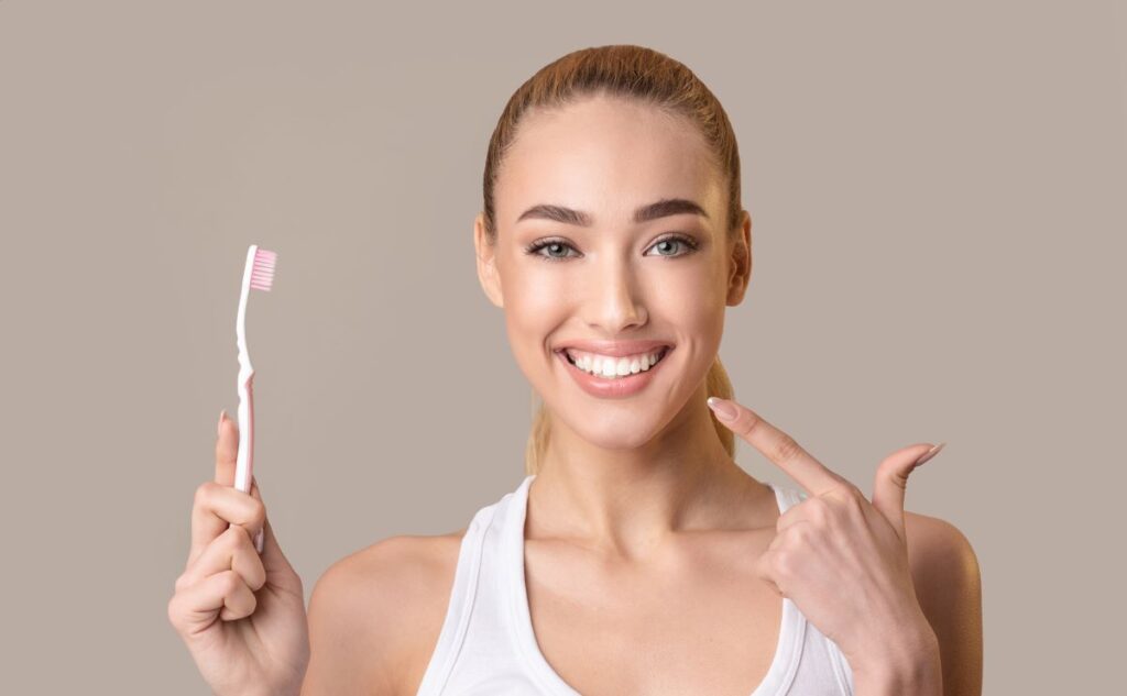 Young woman dental hygienist patient