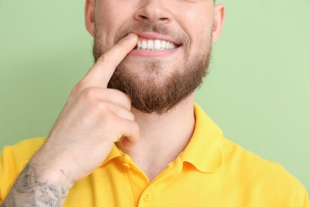 Young man with healthy gums